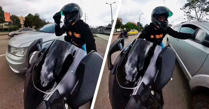 Video-motociclista-rompiendo-espejo-carro-Bogotá